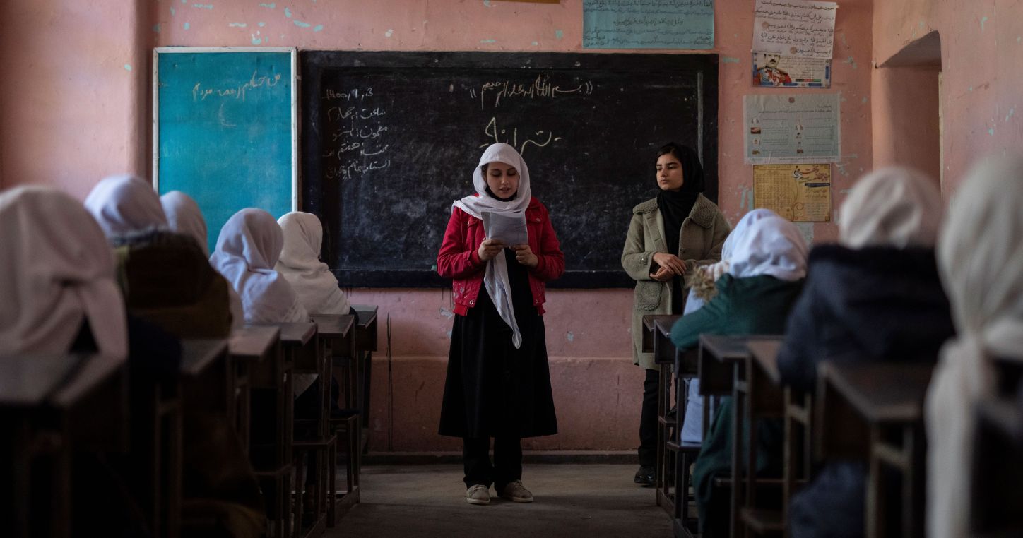 Students learning with Nour